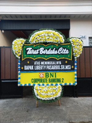 Papan Bunga Duka di Akat