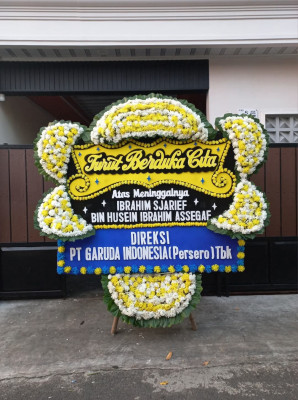 Papan Bunga Duka di Akat