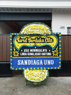 Papan Bunga Duka di Akat